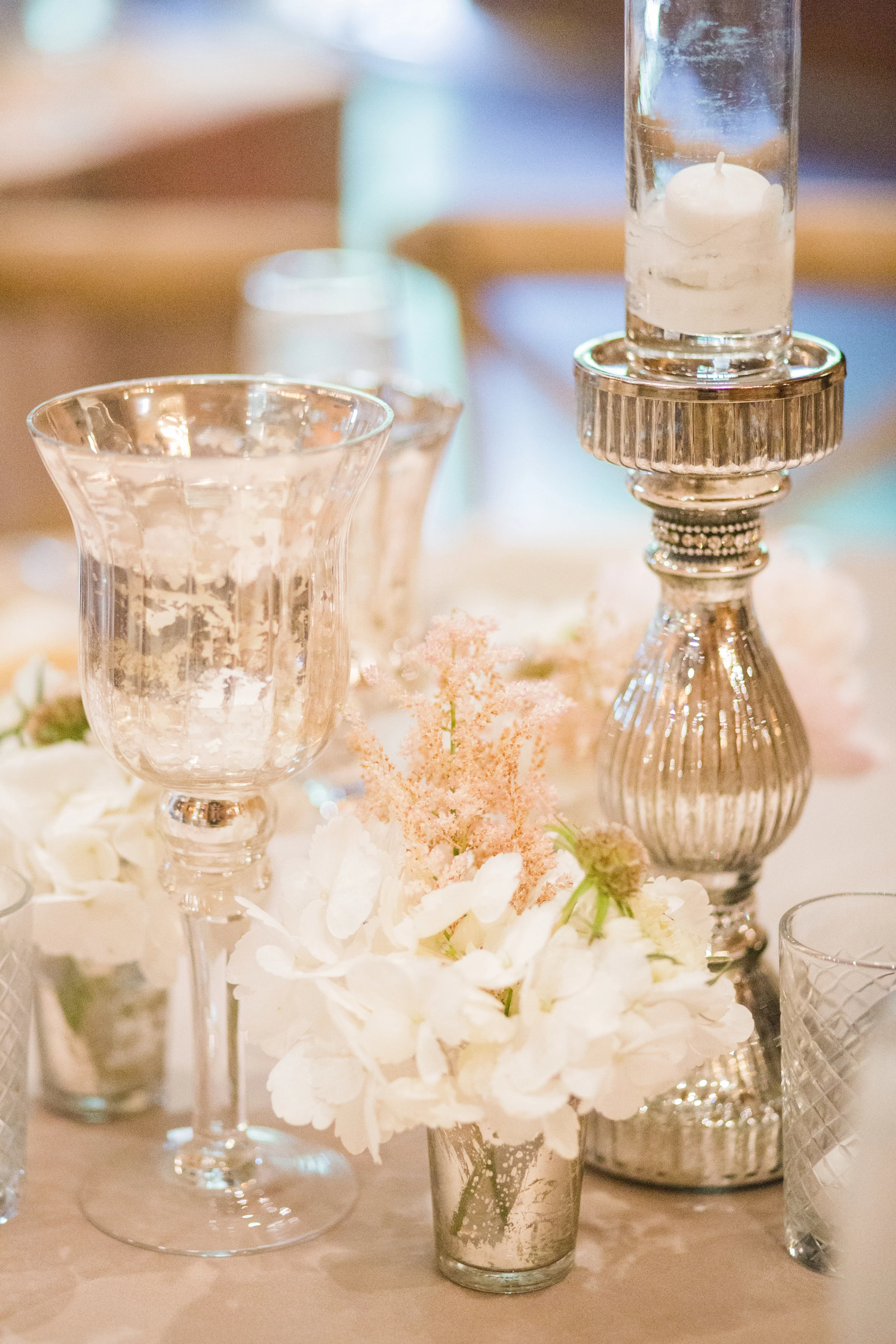 Mercury glass candle white floral wedding tablescape
