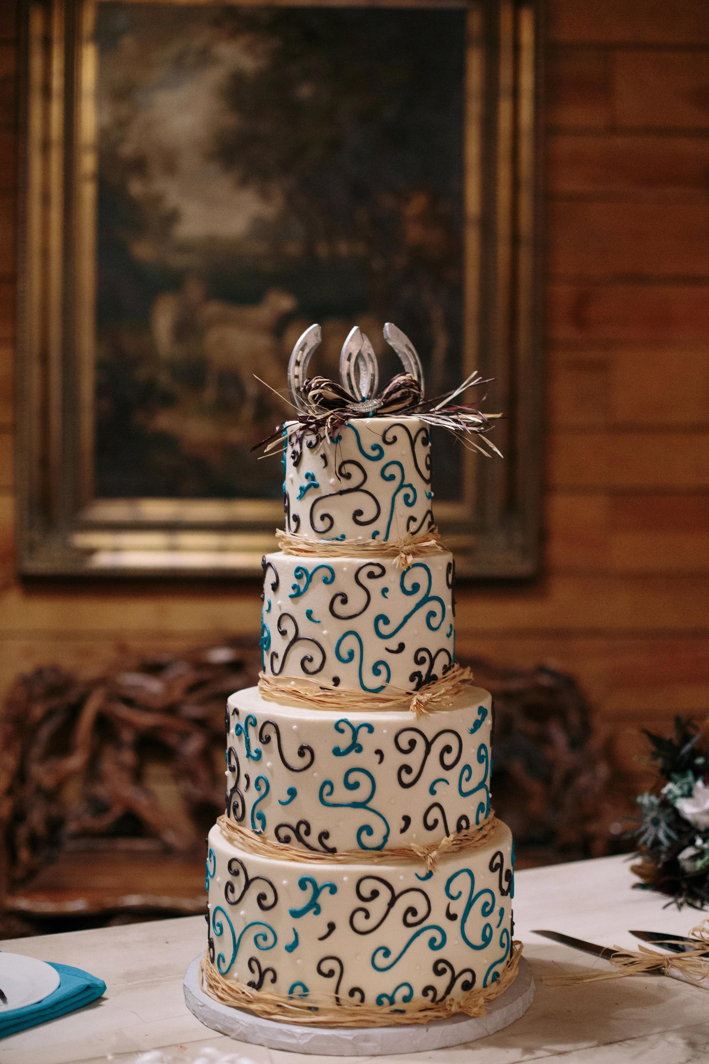 Equestrian Horseshoe purple teal wedding cake
