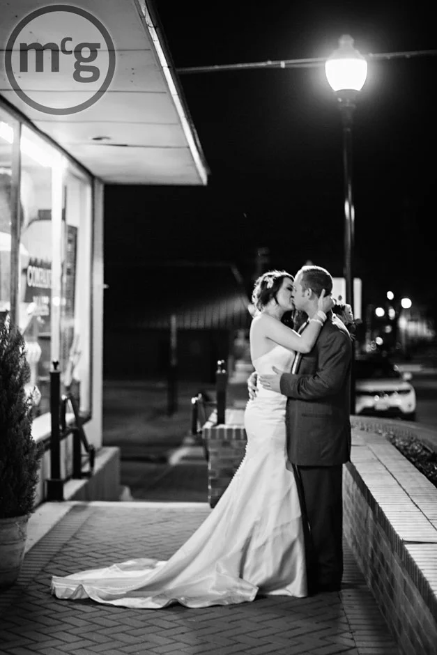 Bride & Groom Kissing in the Dark