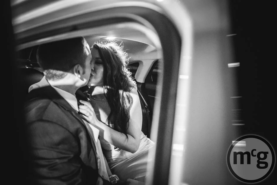 Bride & Groom Getaway Car Kiss