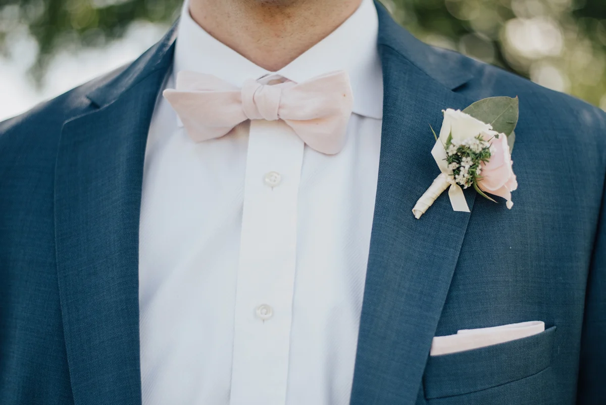Groom navy suit pink bout