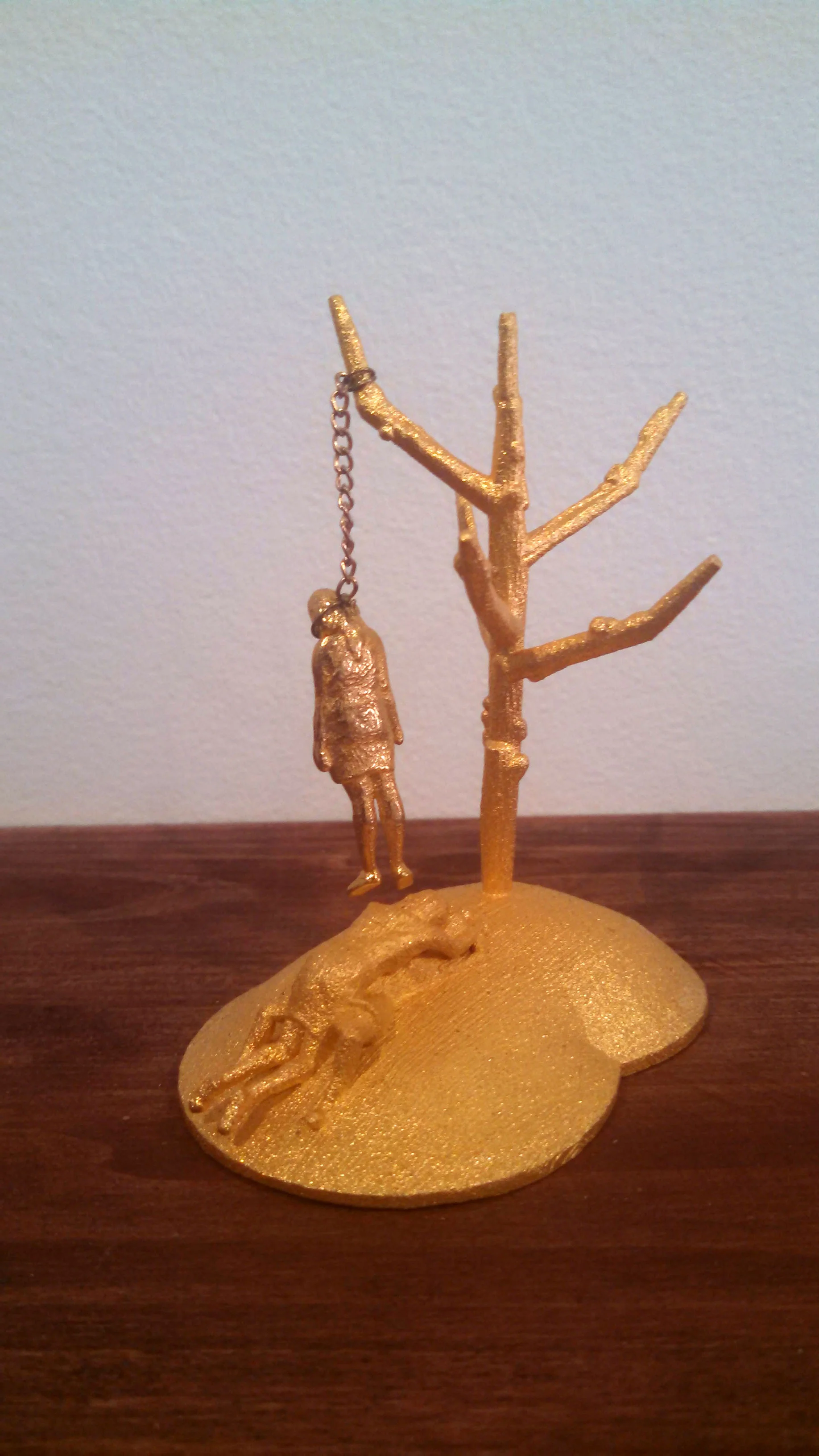 A naked man has few secrets, 3D printed gold steel