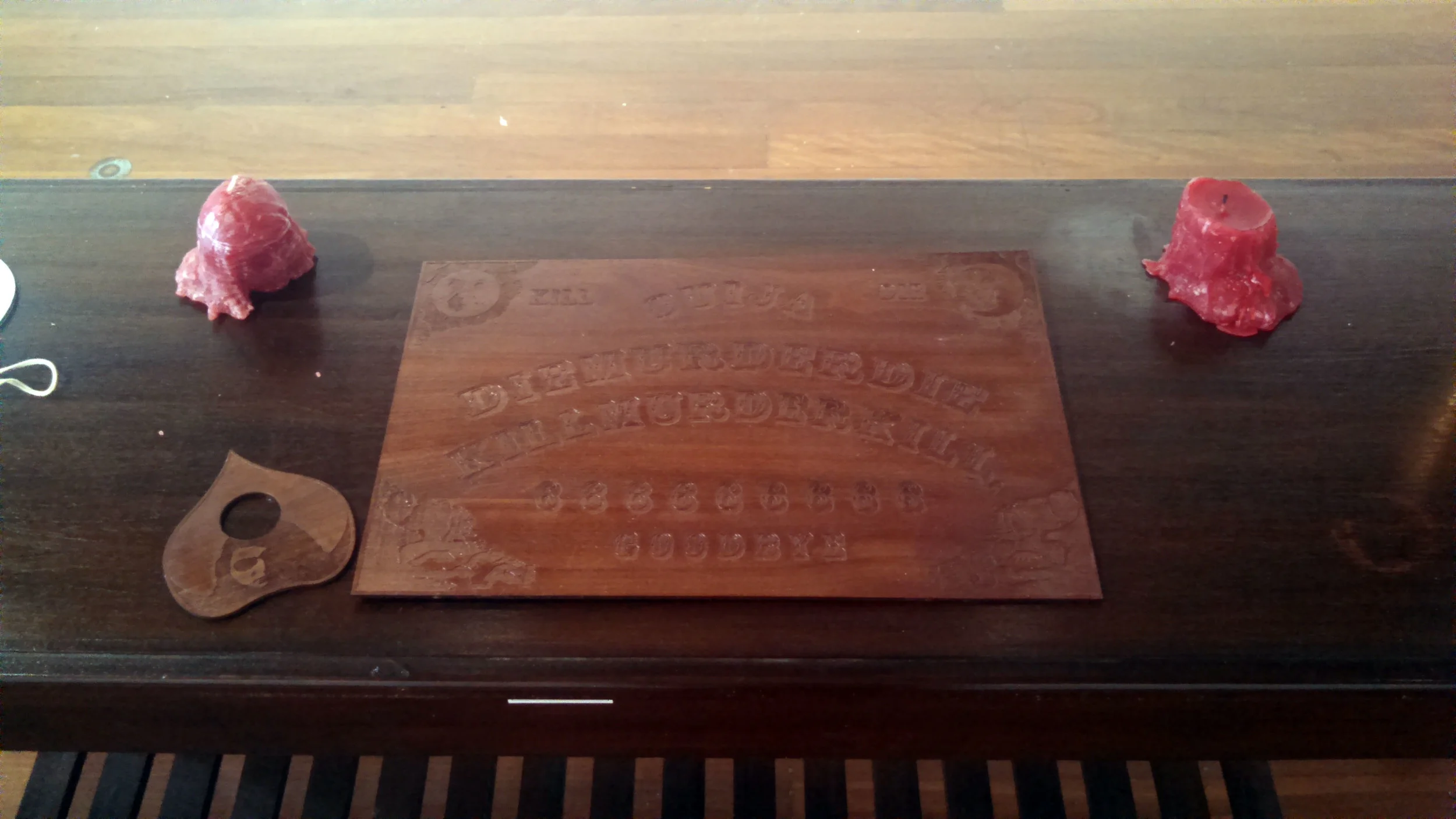 Suggestions, laser cut plywood ouija board, candles