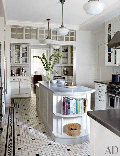 I like that this one is like eight parts white, two parts black. The accents would really bring out the black hardware in my kitchen, while still hopefully masking a lot of Merlin's hair. Of course, I laughed when I clicked on the Architectural Digest link and I found out that this is the kitchen of one Michael J. Foxx.
