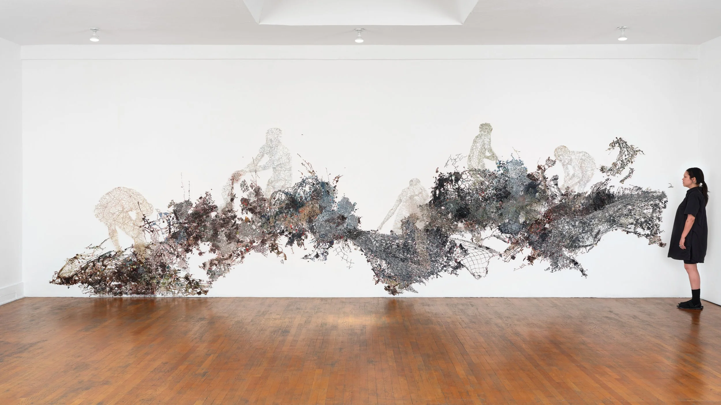   Surge , 2014-25 Acrylic, ink on Tyvek, paper, found maps, collagraph prints and plates, newsprint, envelopes, canvas, map pins  Approx. 87 x 310 x 5 in (221 x 787 x 13 cm Photo by Paul Salveson 