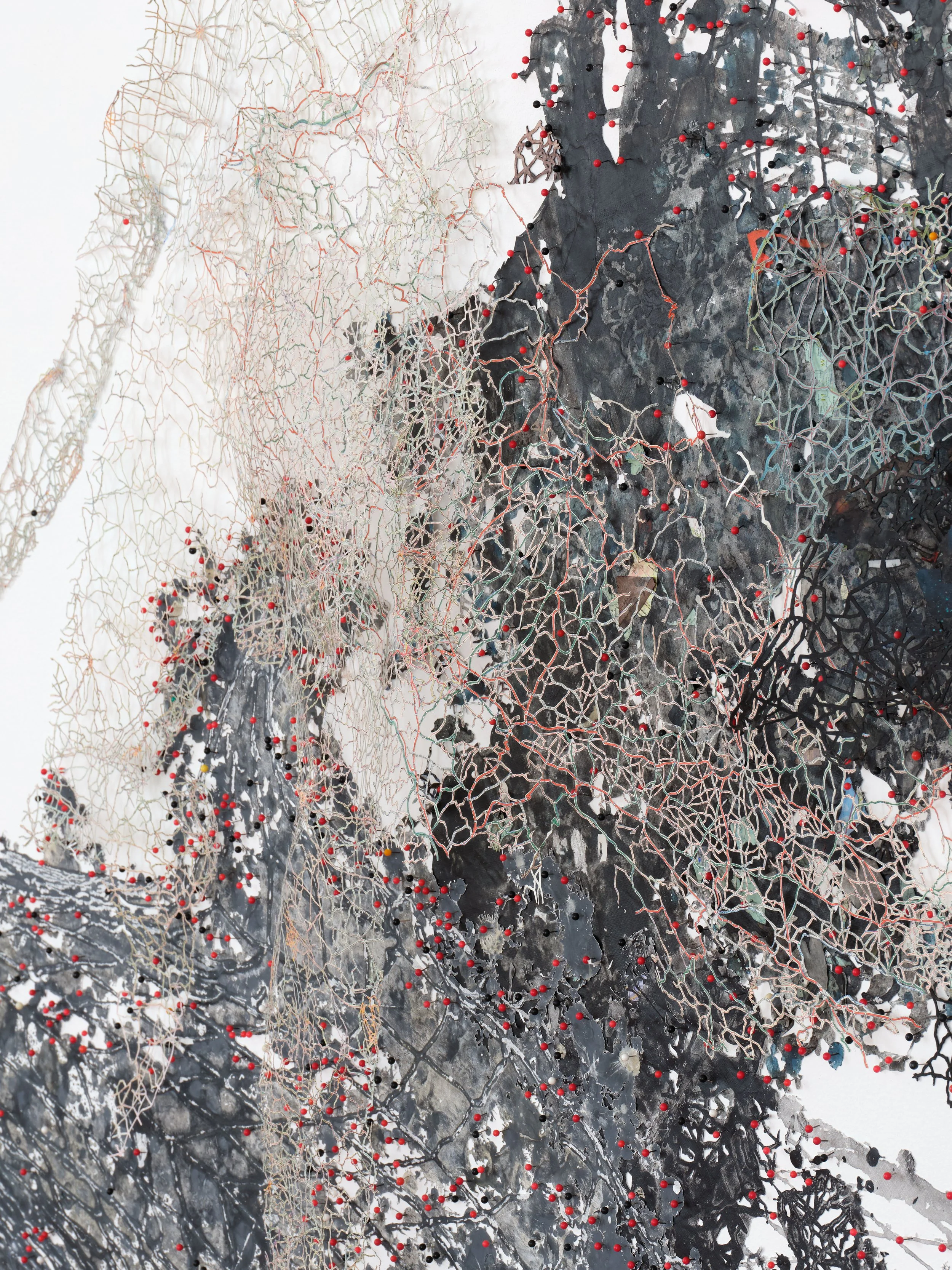   Surge , 2014-25 Acrylic, ink on Tyvek, paper, found maps, collagraph prints and plates, newsprint, envelopes, canvas, map pins  detail Photo by Paul Salveson 