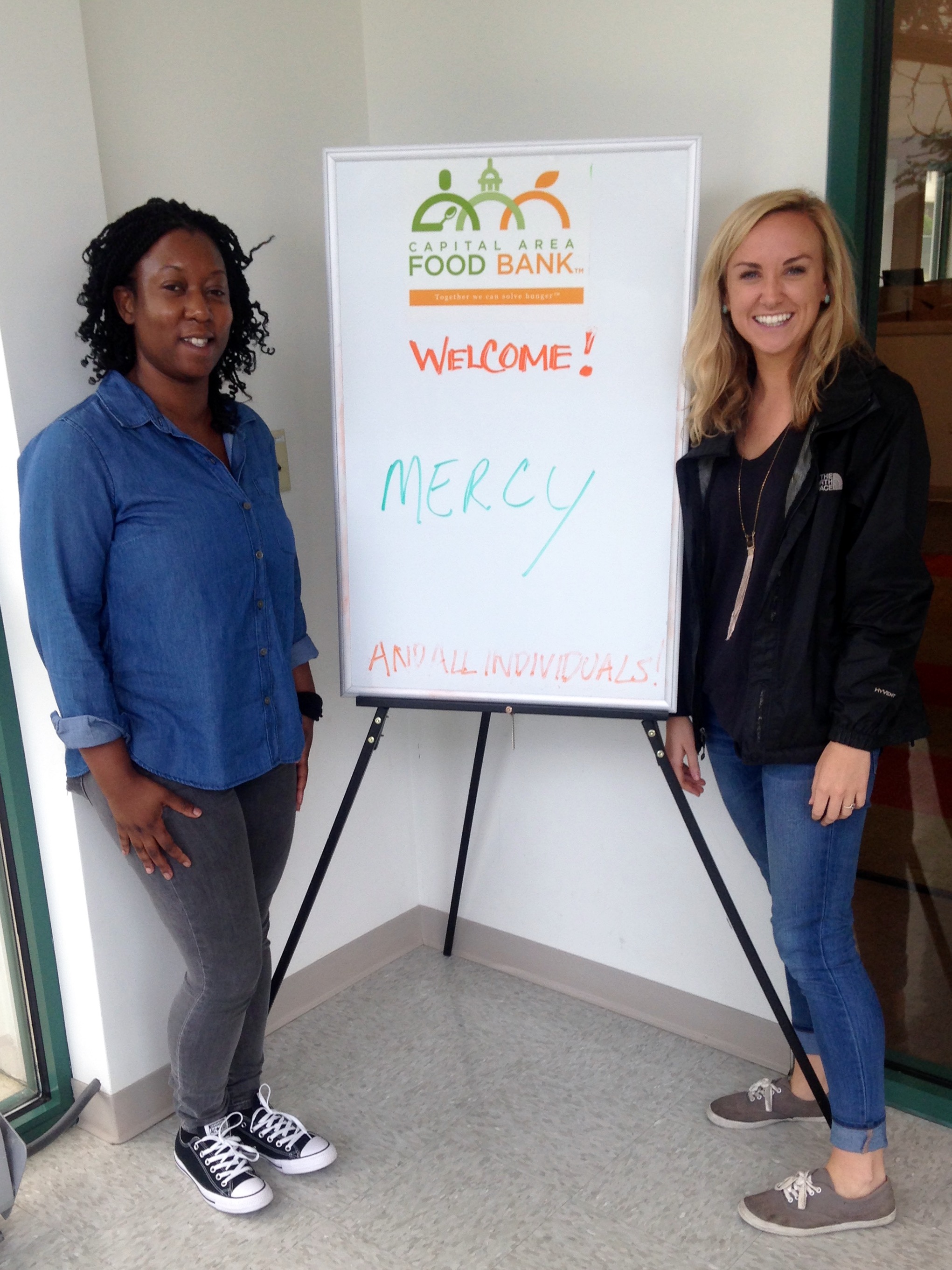Our DC team, Mercy and Casey, at their Day of Service at Capital City Food Bank