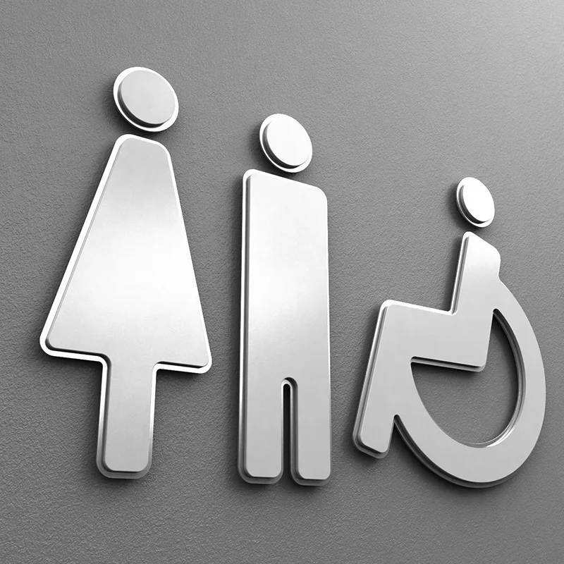 Amenity signage in matte white acrylic, featuring a brushed steel outline.