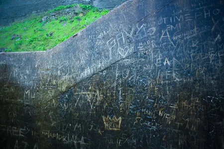 Carvings on the wall down by the Falls.