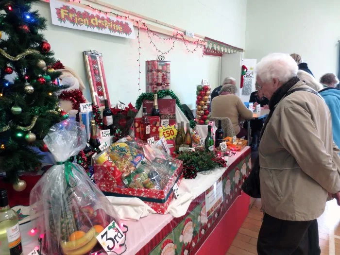 ema9 looking at raffle prizes.jpg