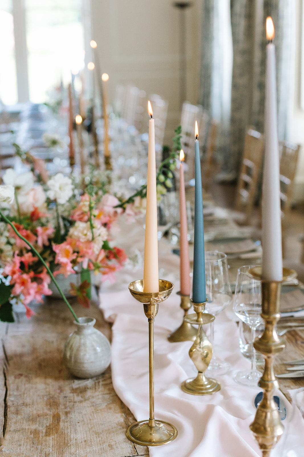 Tapered candles to compliment the blush wedding flowers
