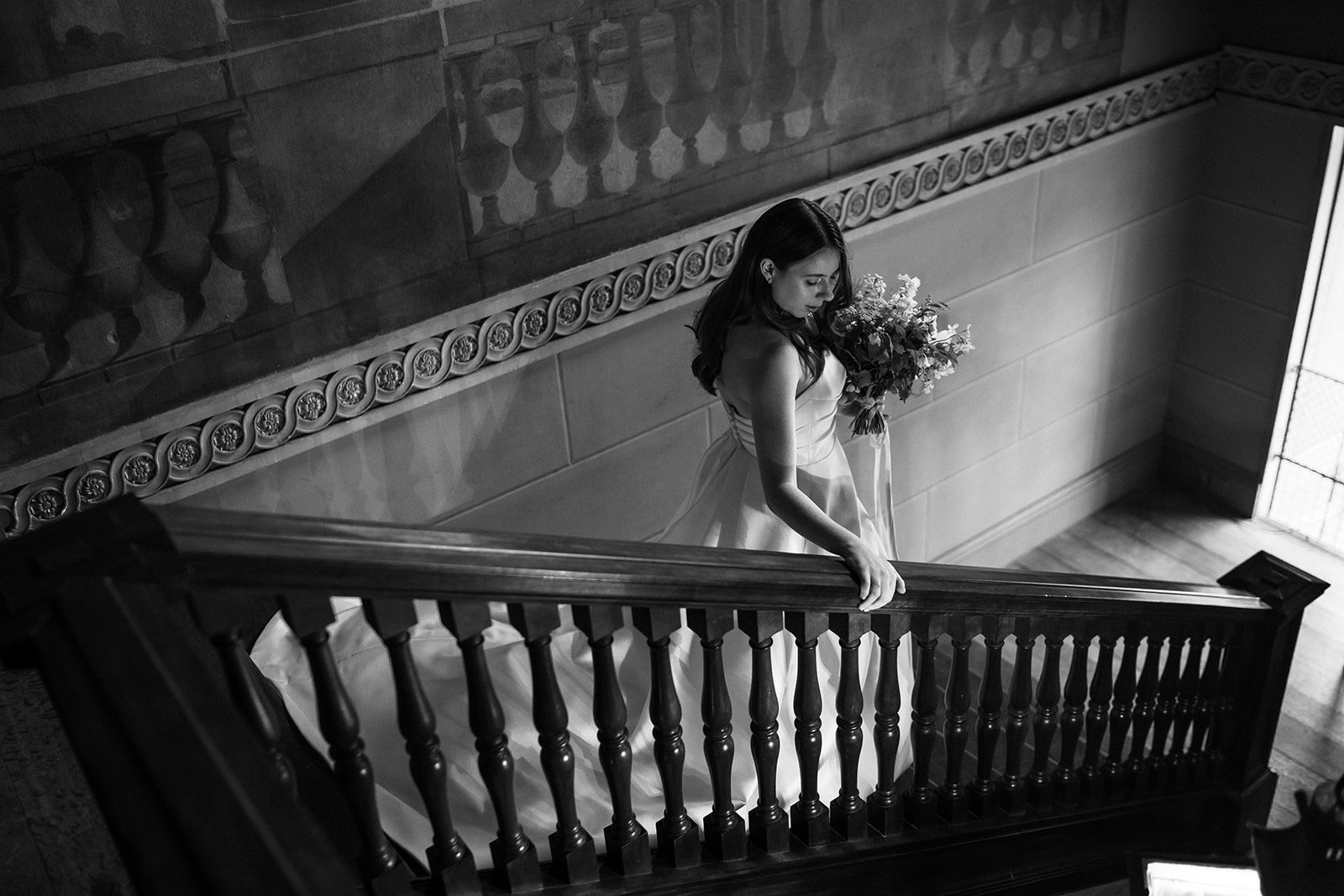 Bride on stairs of Boconnoc