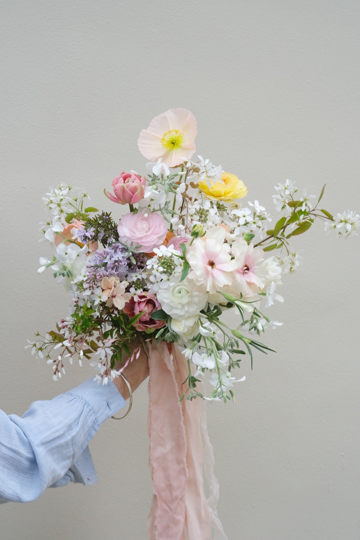 April bridal bouquet ranunculus