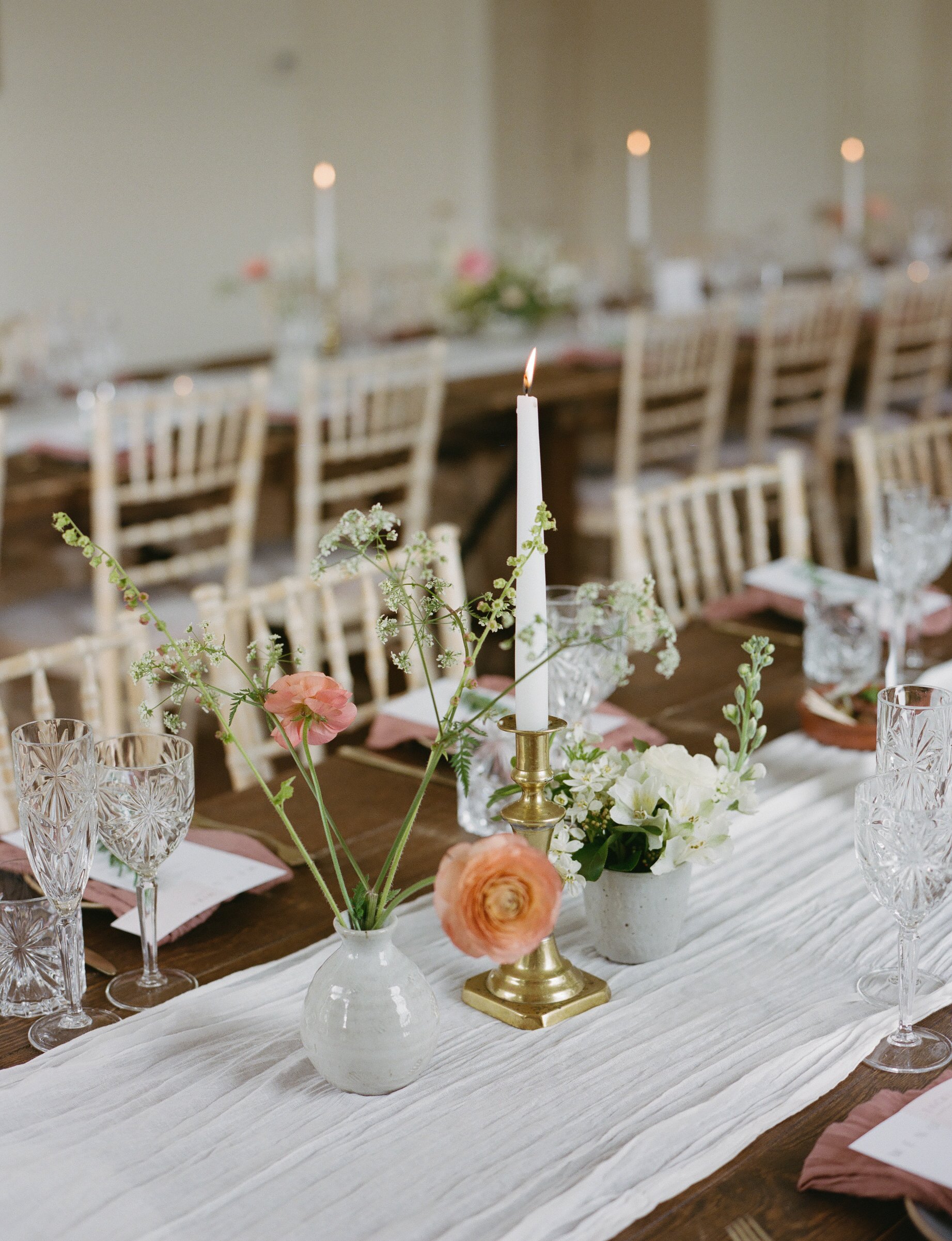 Tapered candles and seasonal flowers  for spring wedding