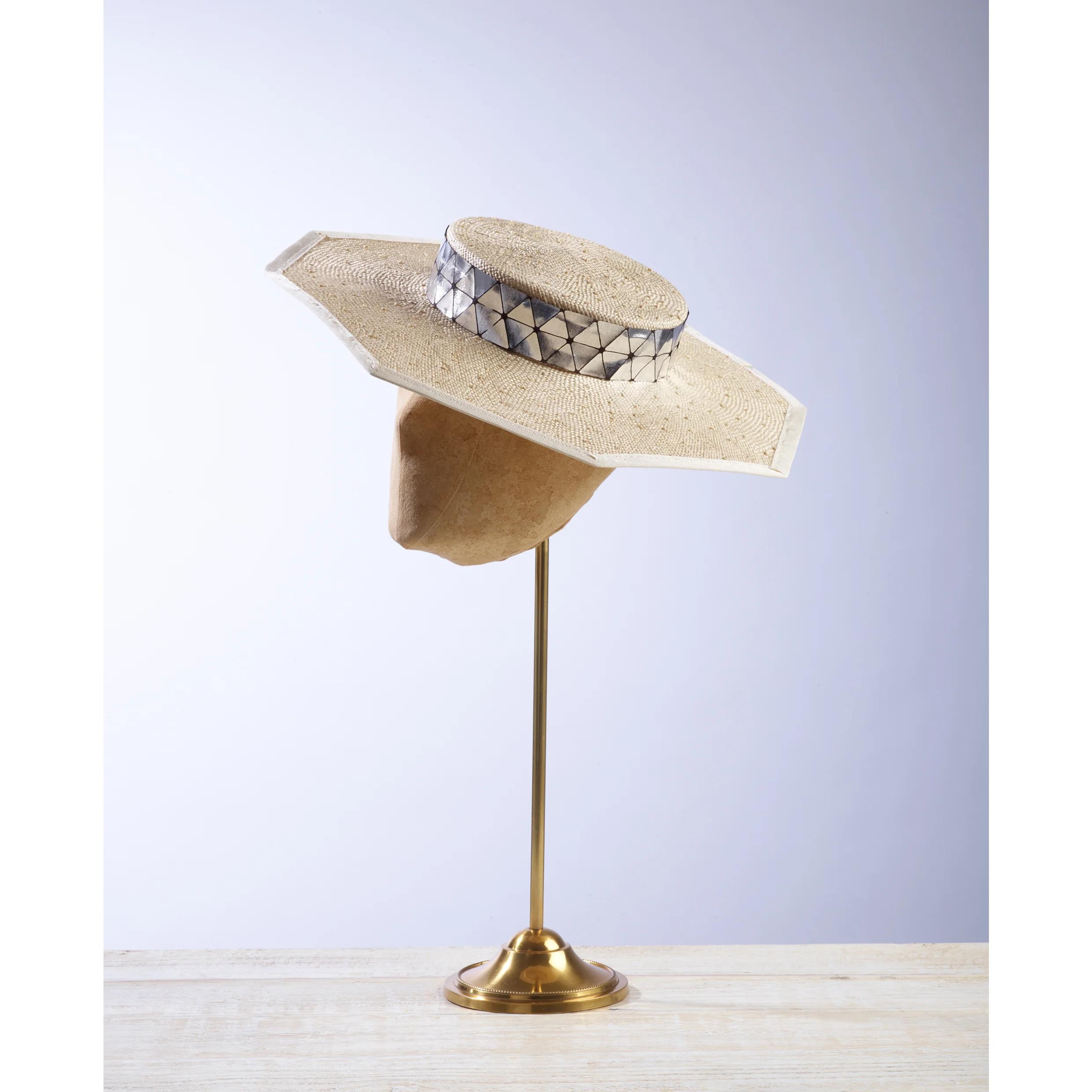 COFFER - £80 Cream knotted sisal straw octagon boater with silver and black diamond trim.