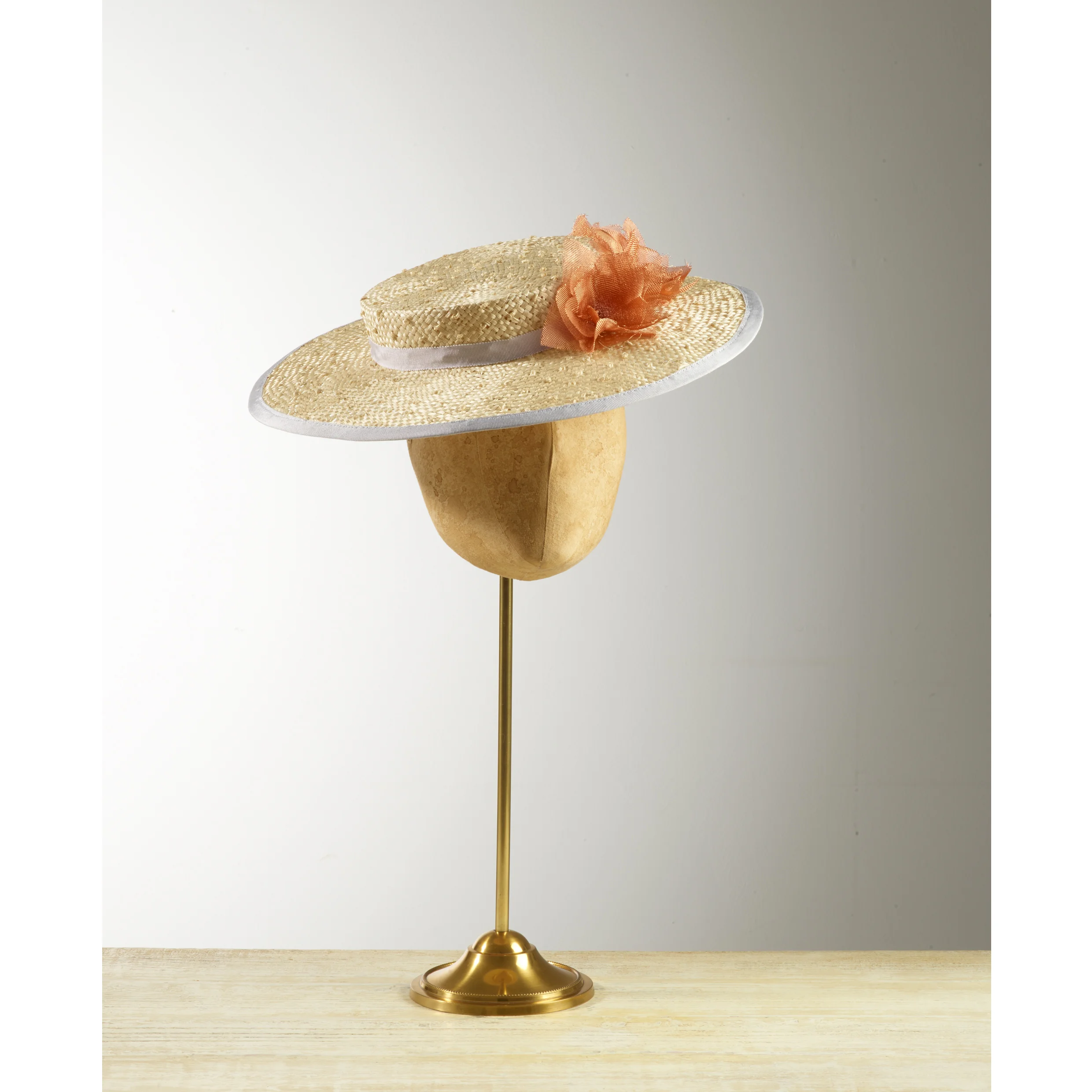 STOWAWAY - £85 Cream knotted sisal straw boater with silvery lilac trim and mesh copper flowers.