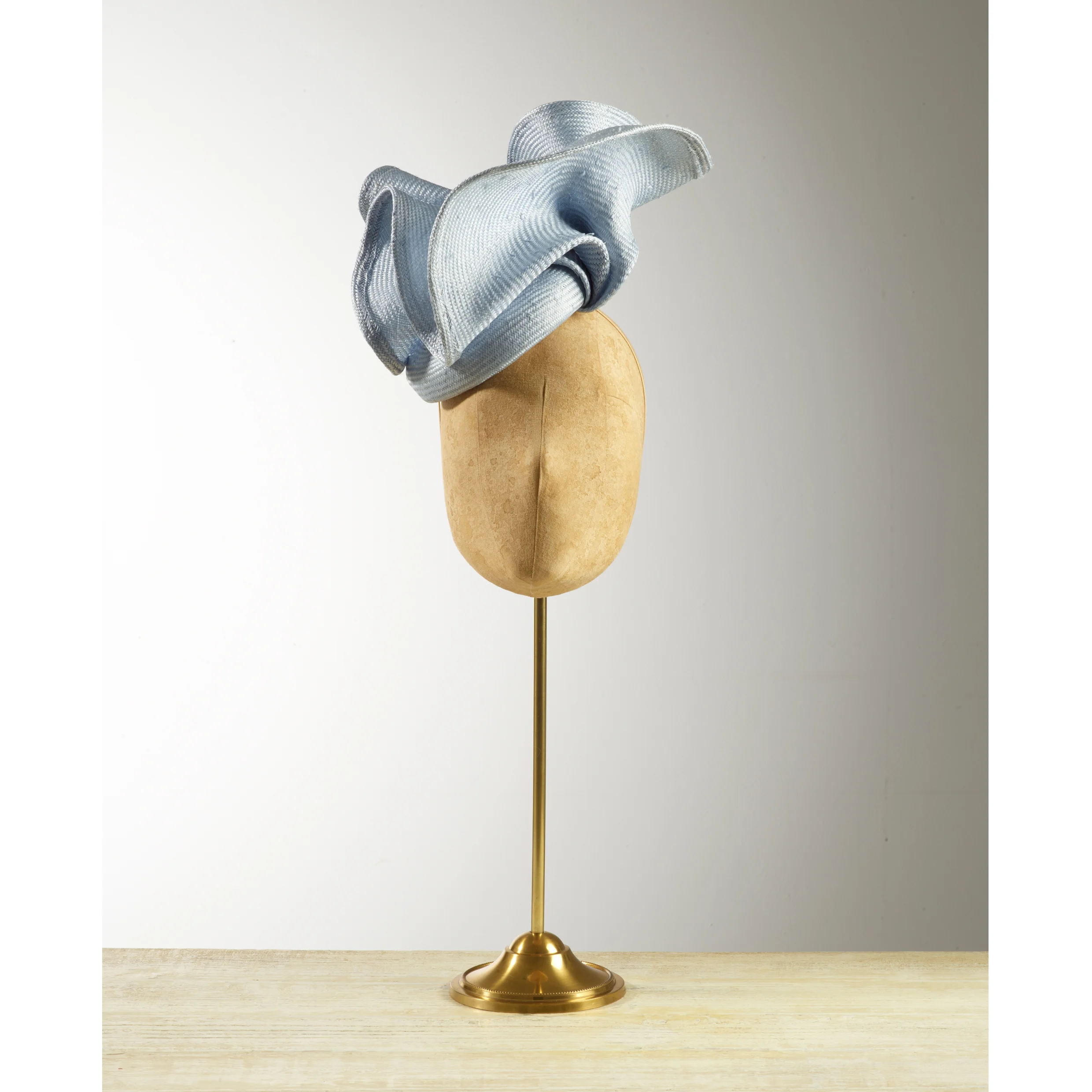 VOLUTE (Pale Blue) - £80 Pale blue sisal straw button headpiece with matching structural folds.
