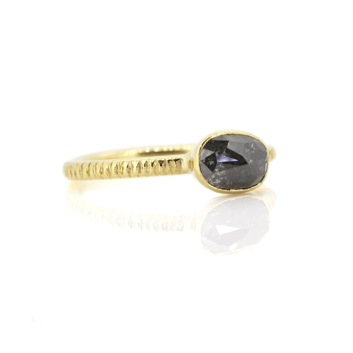grey oval diamond ring side.jpg