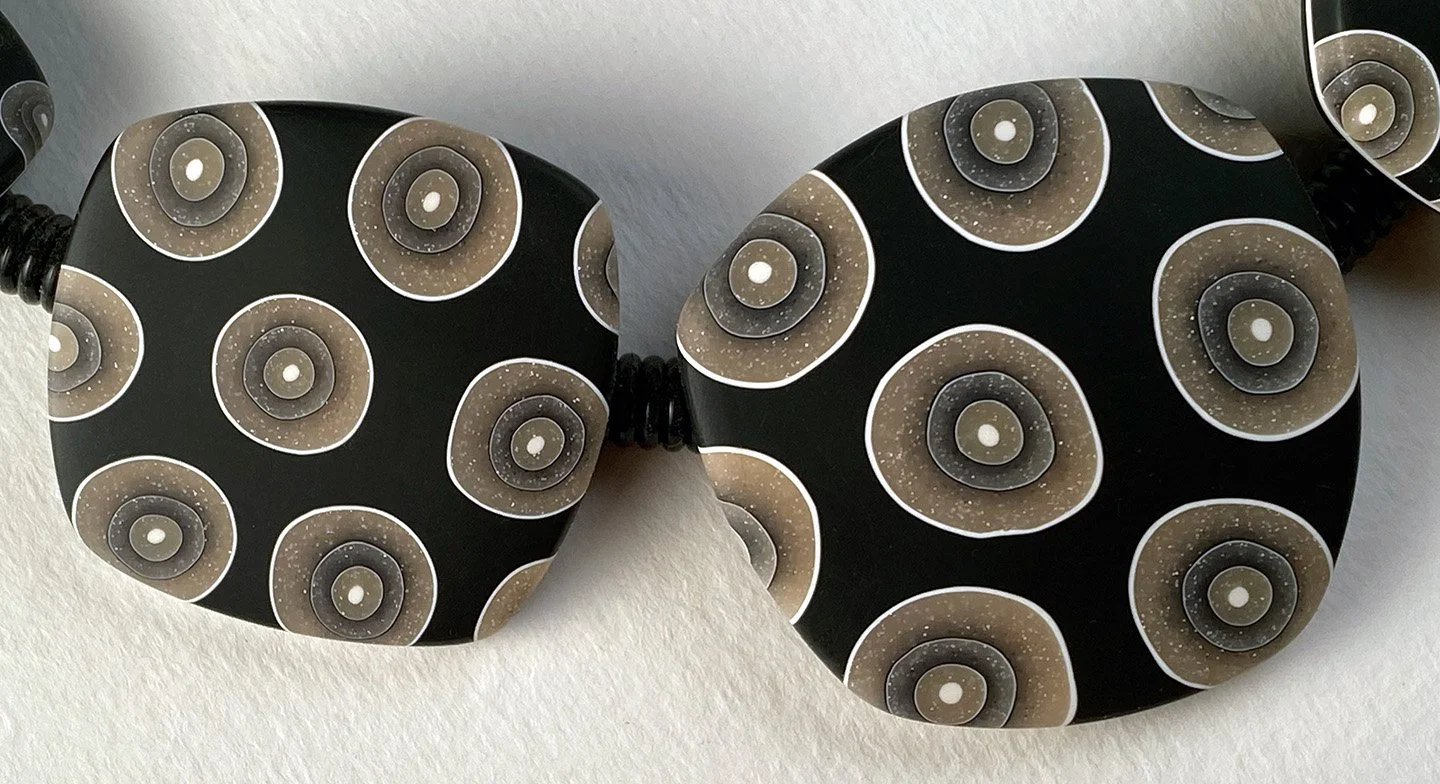 five tile in black transl spots 2.jpg