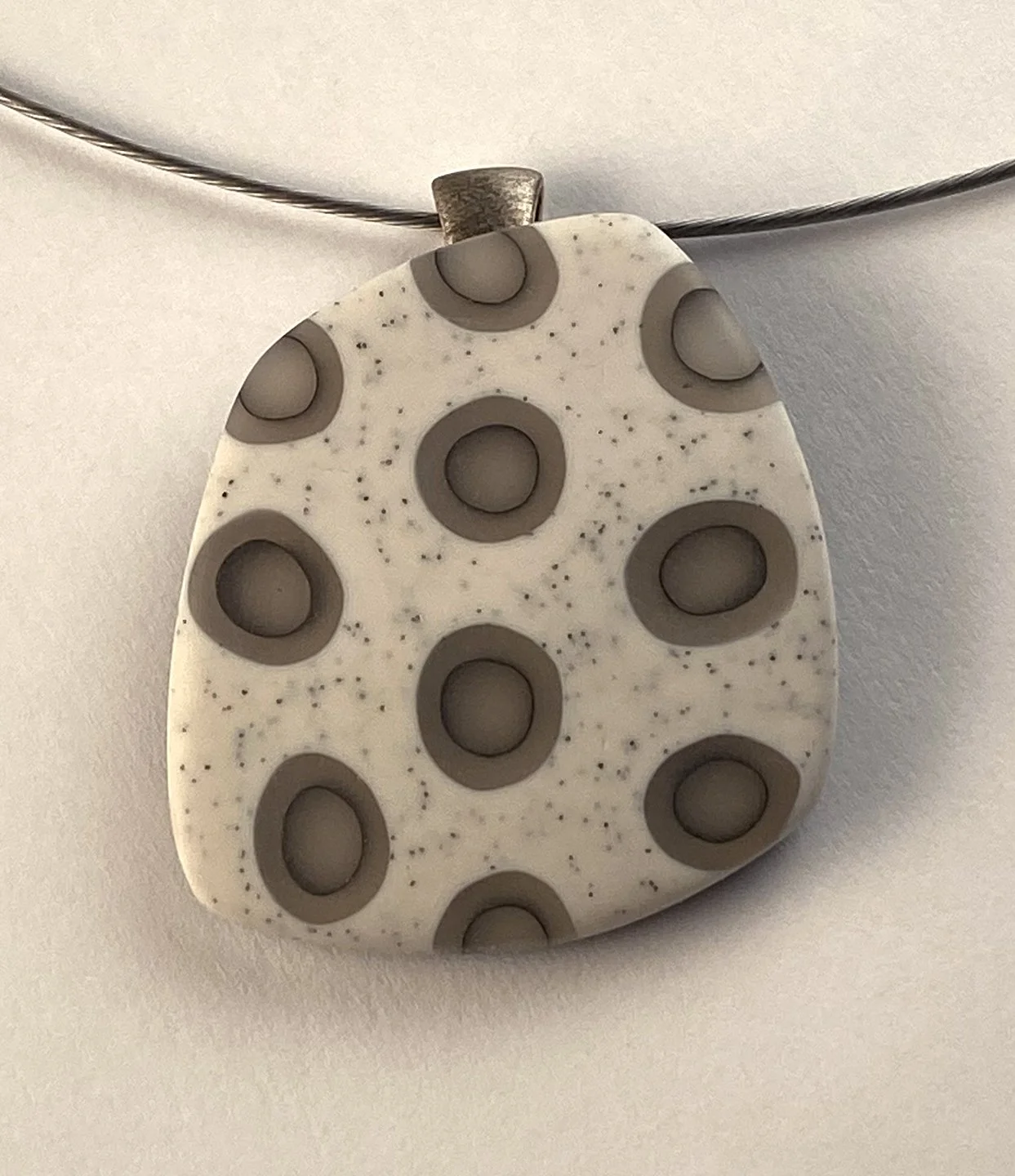 cream pendant with trans spots.jpg