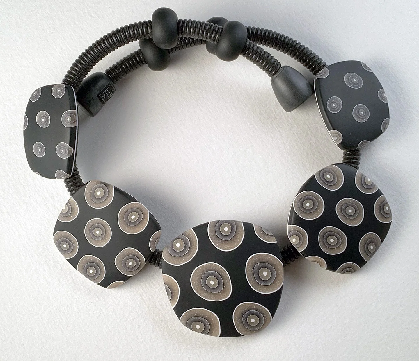 five tile in black transl spots 1.jpg