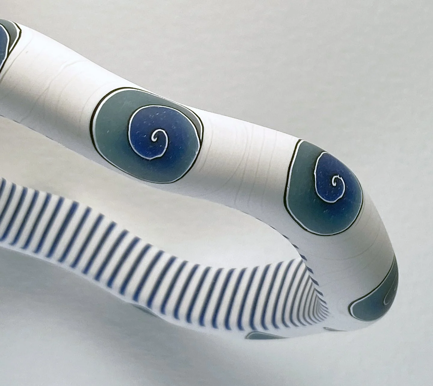 White with bluegreen spirals 2.jpg