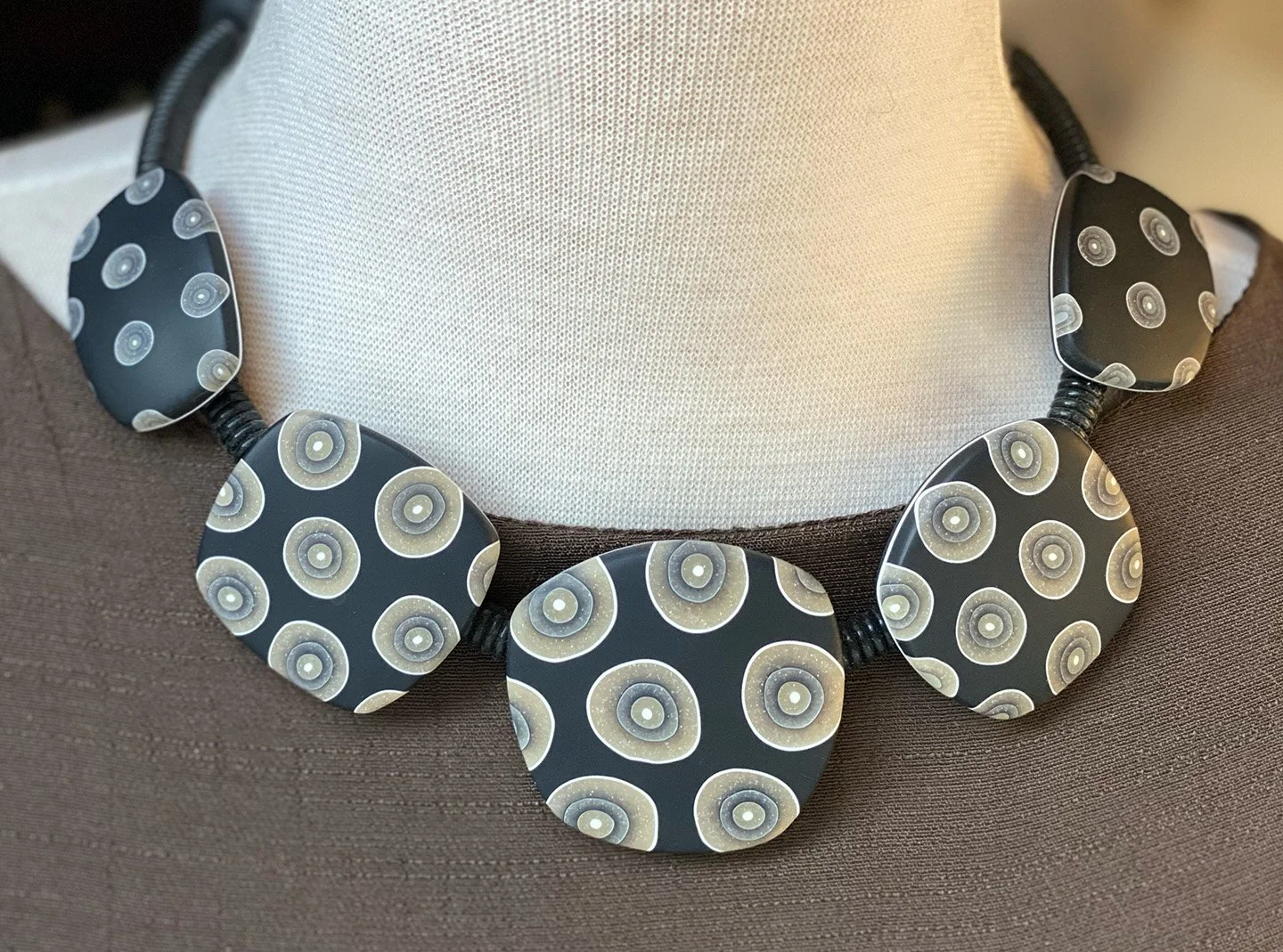 five tile in black transl spots 3.jpg