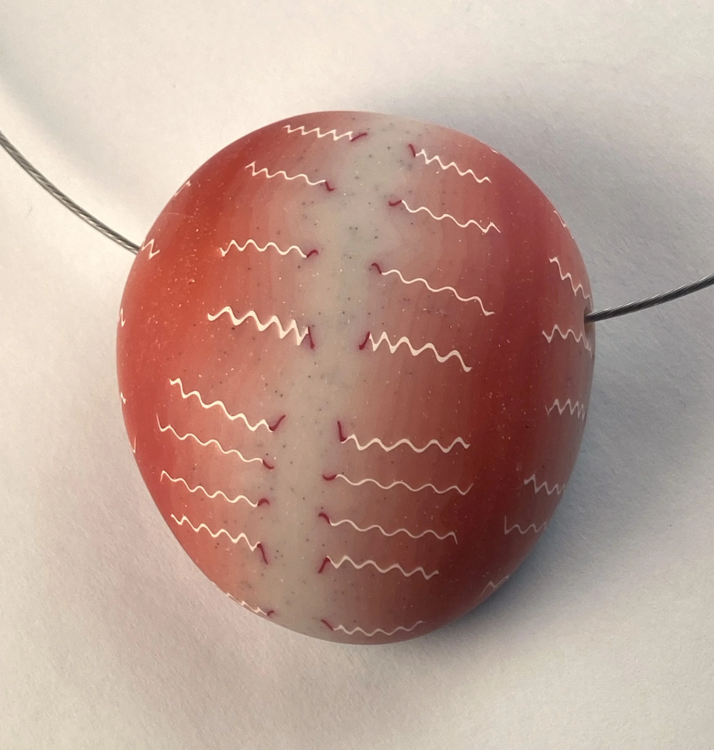 mitosis river rock pendant reds.jpg