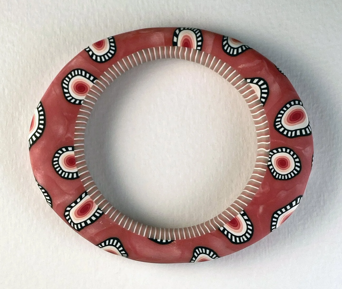 Oval bangle in pearly cranberry spots 2.jpg