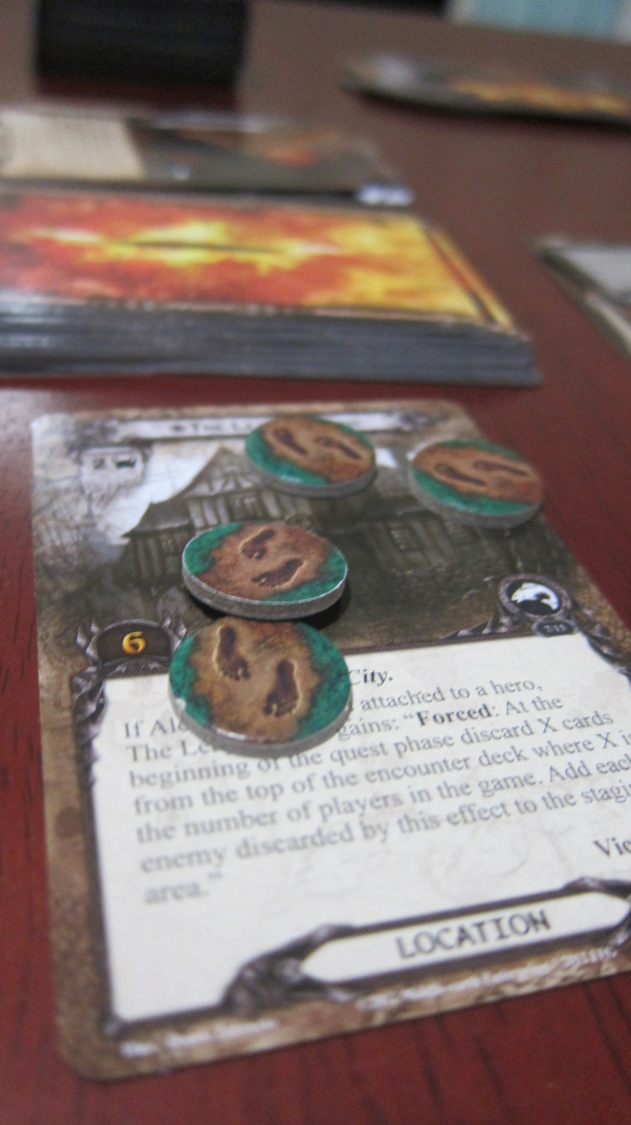 I call this card the Tavern of Doom. Because you go in for a drink and end up leaving robbed and stabbed. Joy of joys.
