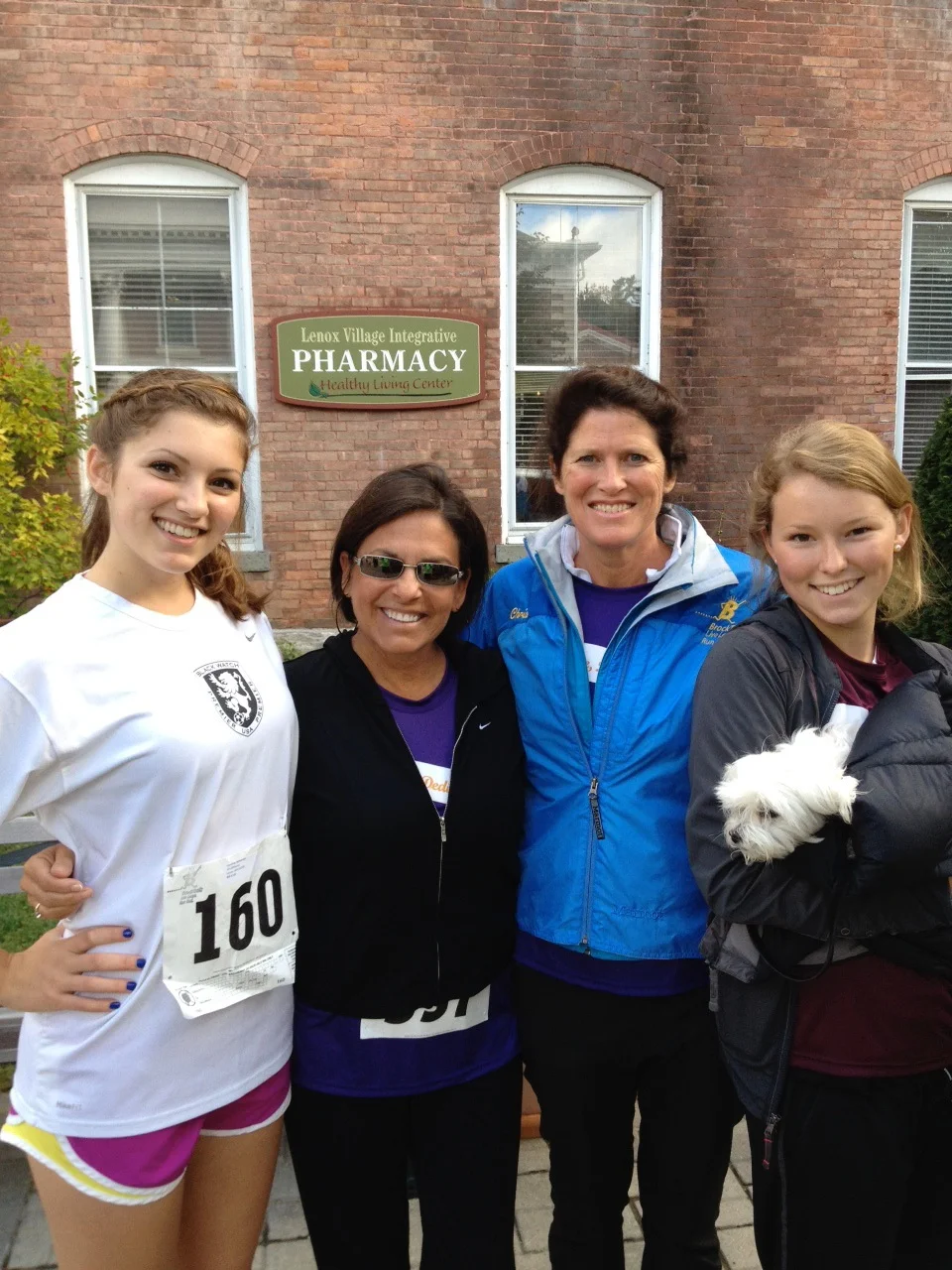 Caroline with her mom and big sis and close friend before the race.