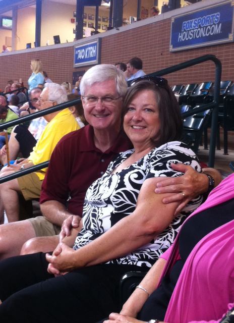 Brigitte with her husband, Dwight, at a Houston Astros game. 