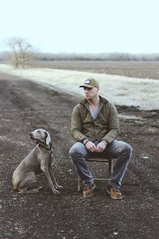 Co-owner Travis and his dog, Delilah. 