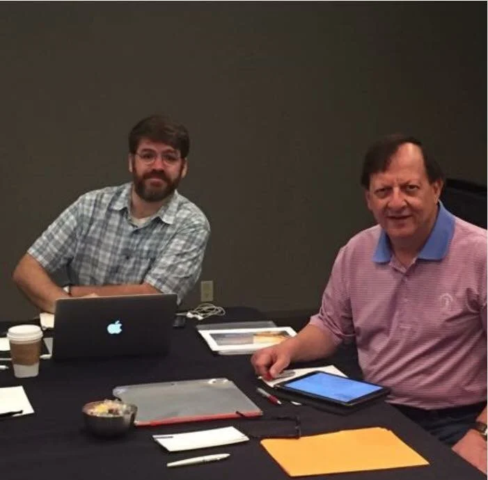Polishing a vital presentation for our company’s annual leadership meeting with Sandy Schwartz, the president of our company.