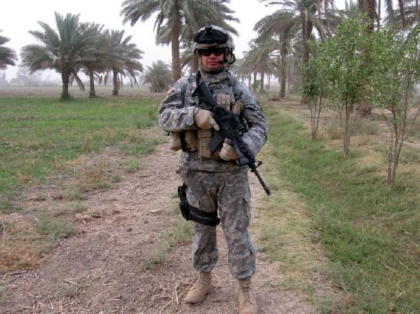 Conducting a cordon and search in a palm grove south of Baghdad as Commander of Troop E, 108th Cavalry.