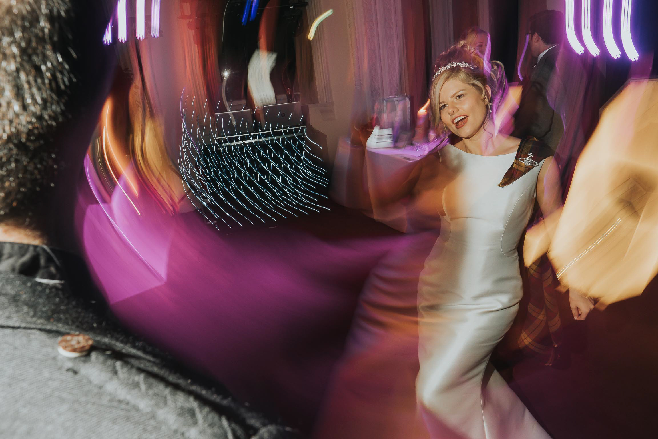 happy bride enjoying a dance on her wedding day