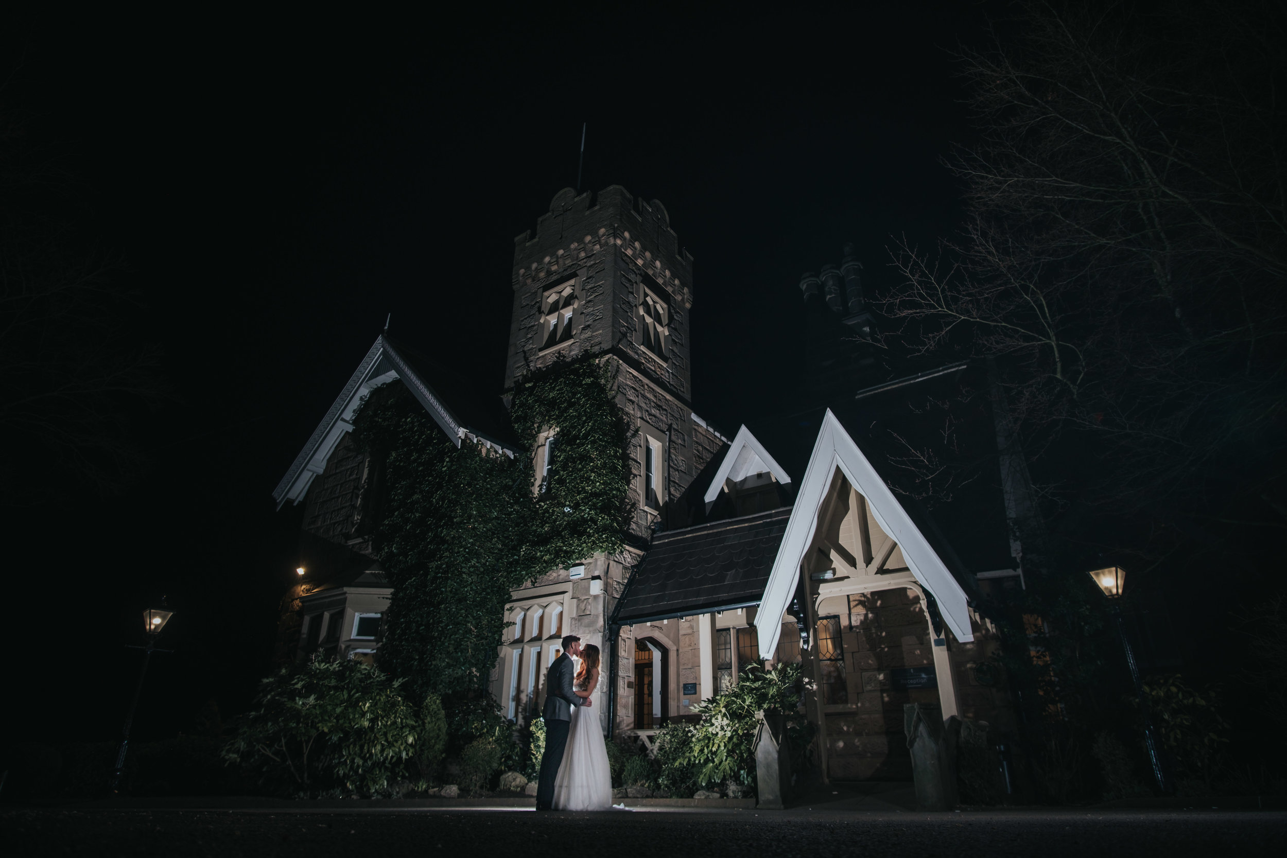 bride and groom at west tower exclusive wedding venue in ormskirk in the evening