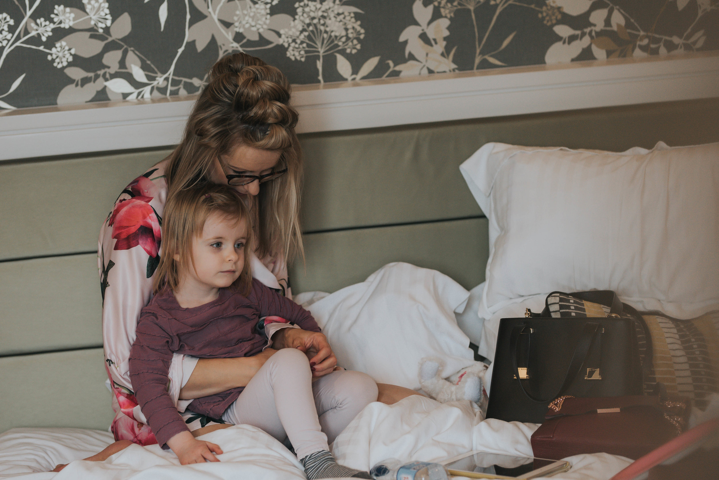 mother and daughter on their wedding day during bridal prep