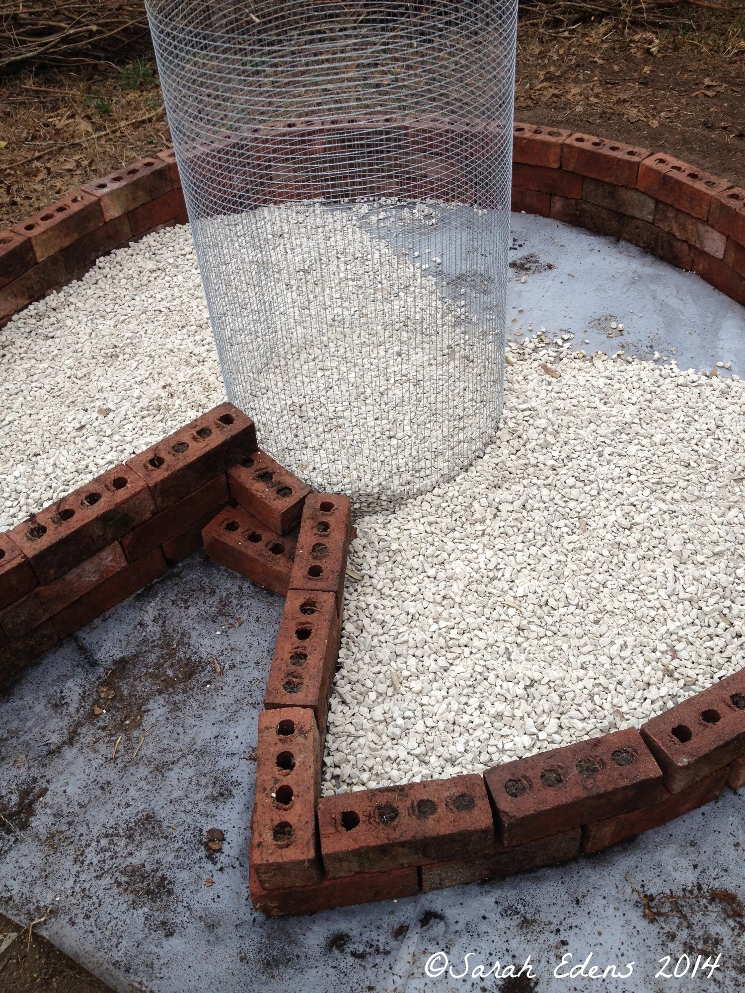 Filling the bed with crushed limestone