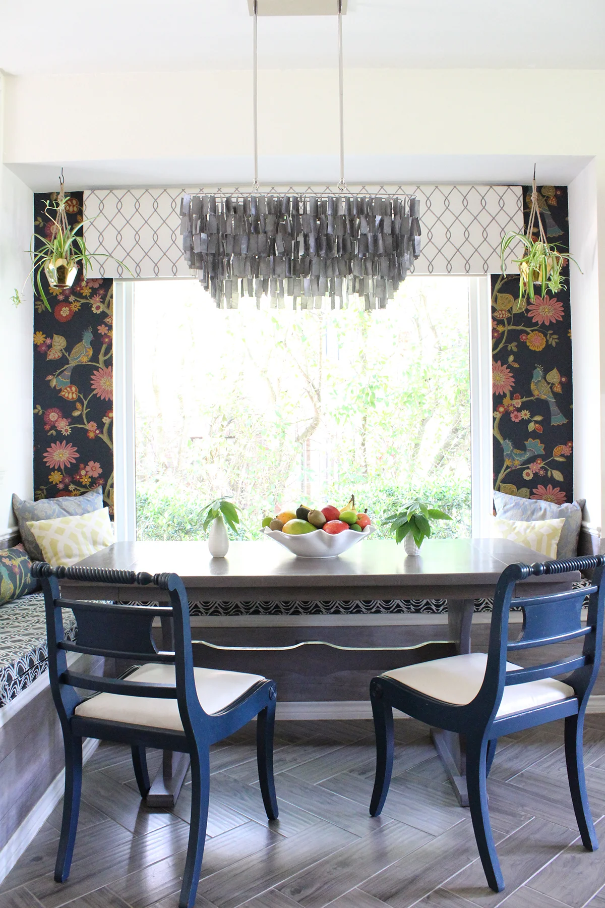  Breakfast nook featuring fabric wallpaper, capiz chandelier and herringbone tile floors by Kristin Laing Designs 