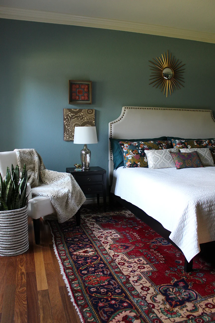  Bedroom with vintage persian rug and Farrow and Ball Oval Room Blue on the wall by Kristin Laing Design 