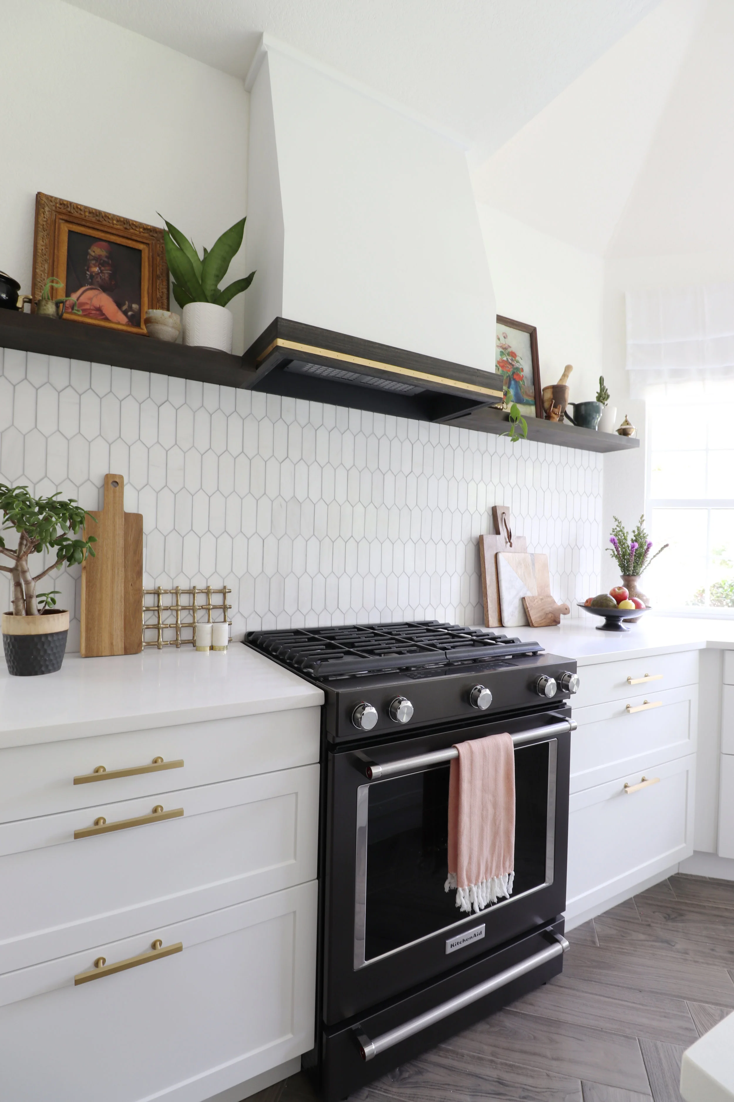 kitchen custom hood with brass detail .jpg