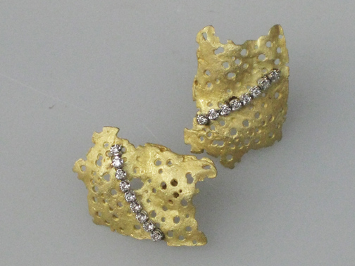 gold wisps with diamonds earrings$7500.00