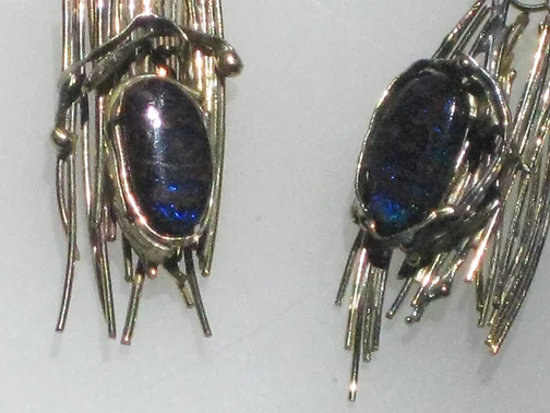 Gold sticks and Opal Earrings detail