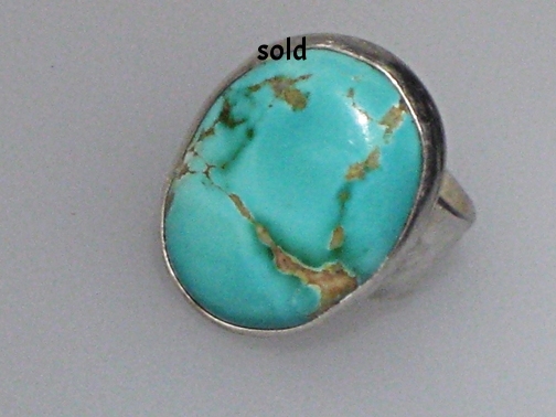 Turquoise planet ring  $ 385.00