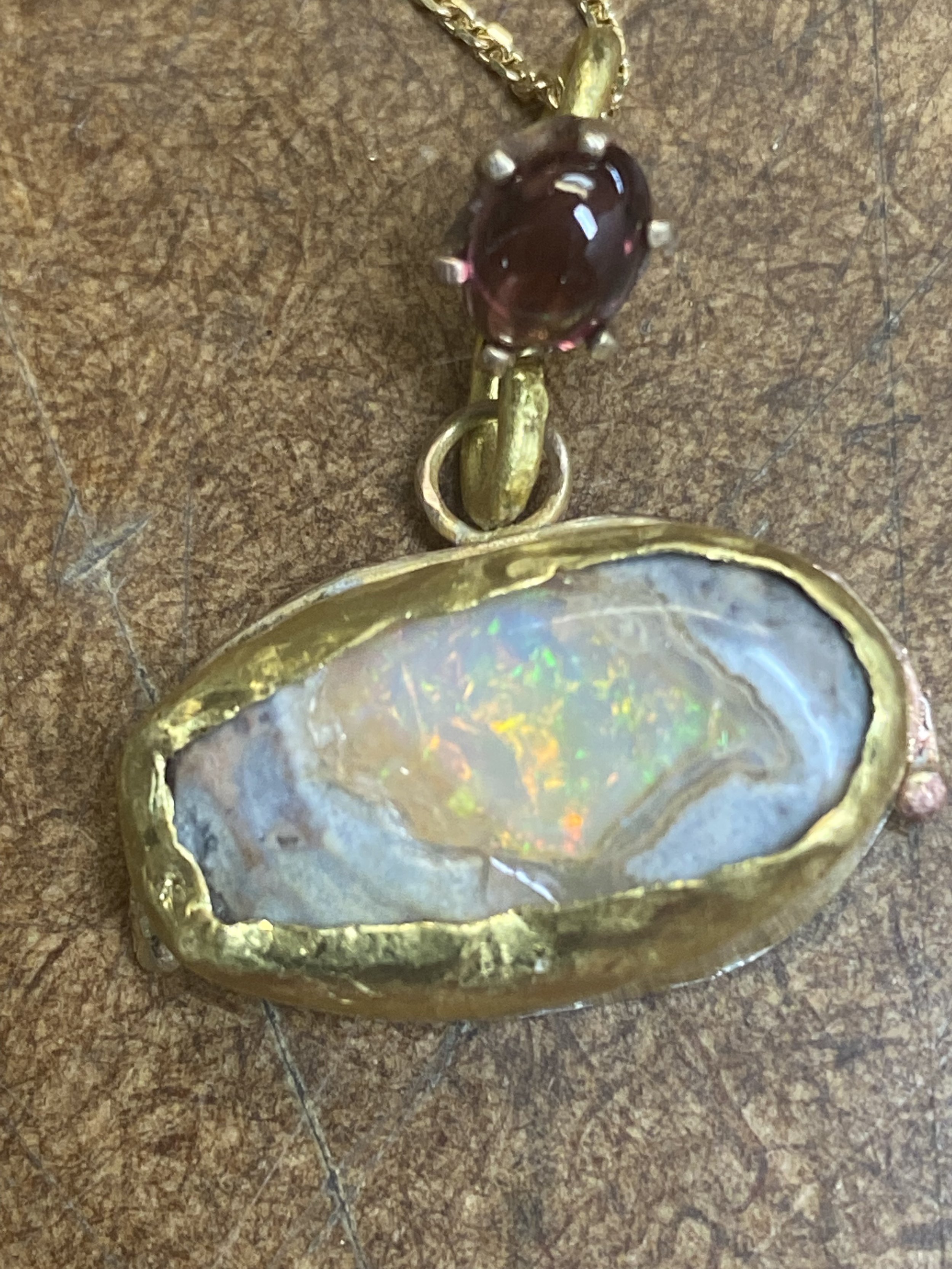 Opal with garnet drop $1800