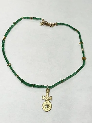 Emeraldnecklace with gold accents and !8kt gold and diamond pendant. $4300