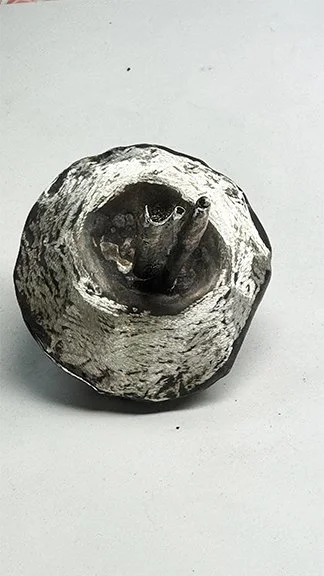 silver and black donut brooch $225