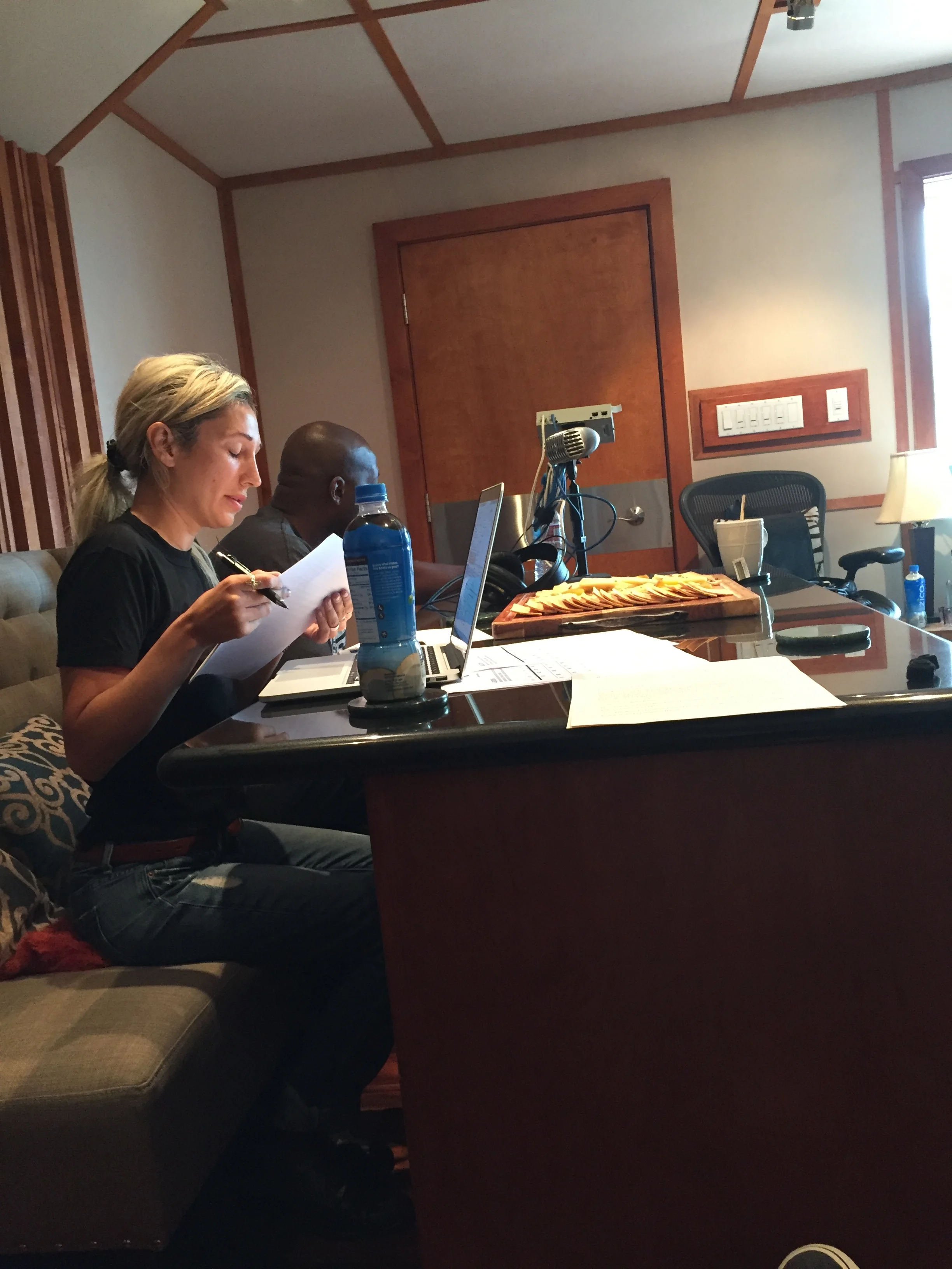 Lulu Delalama of Ethno Multimedia prepares to gives direction to Spanish speaking talent.