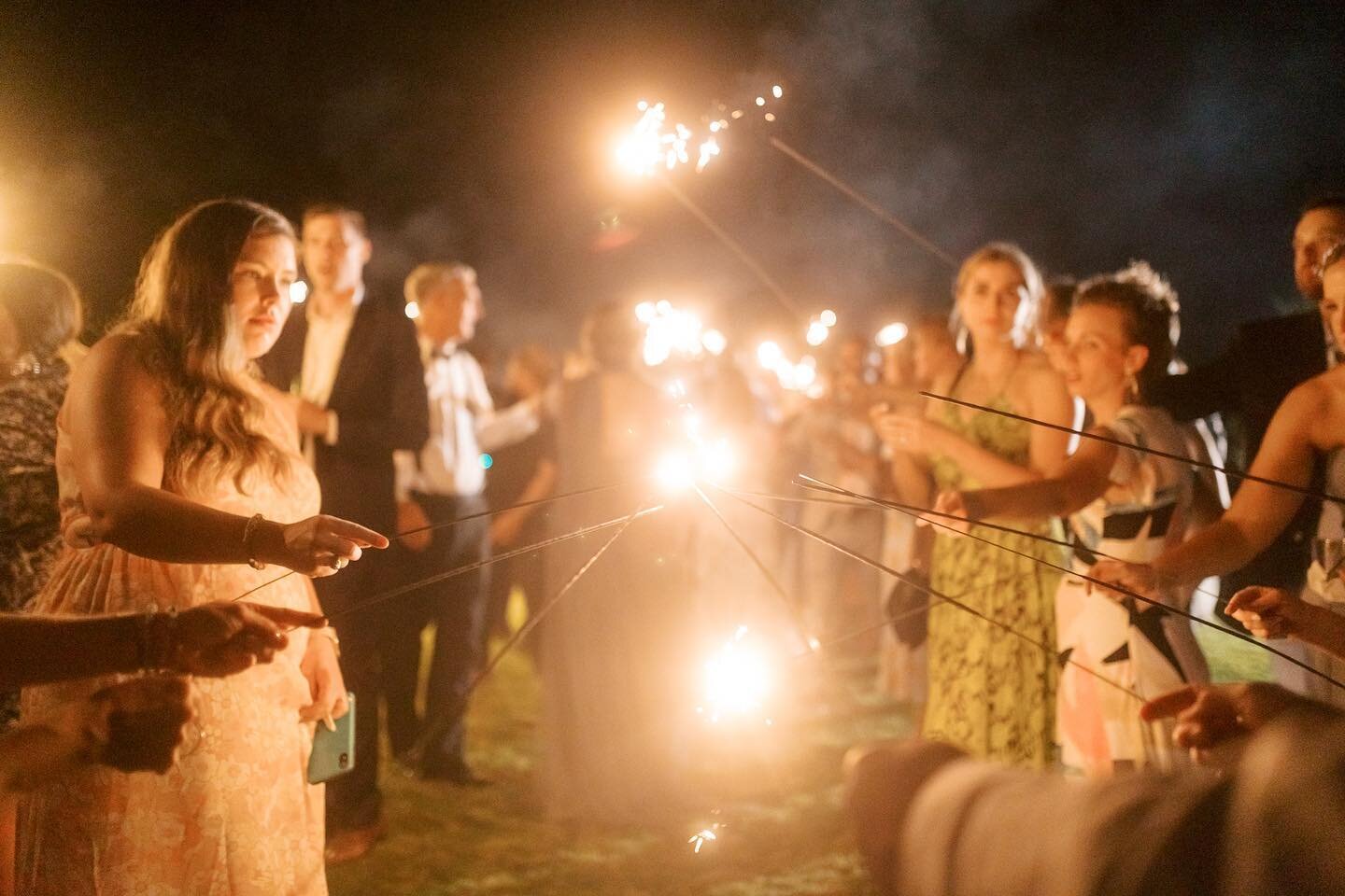 Sparkler exits, beautiful, but a bit of a challenge. It takes some teamwork to get them all lit